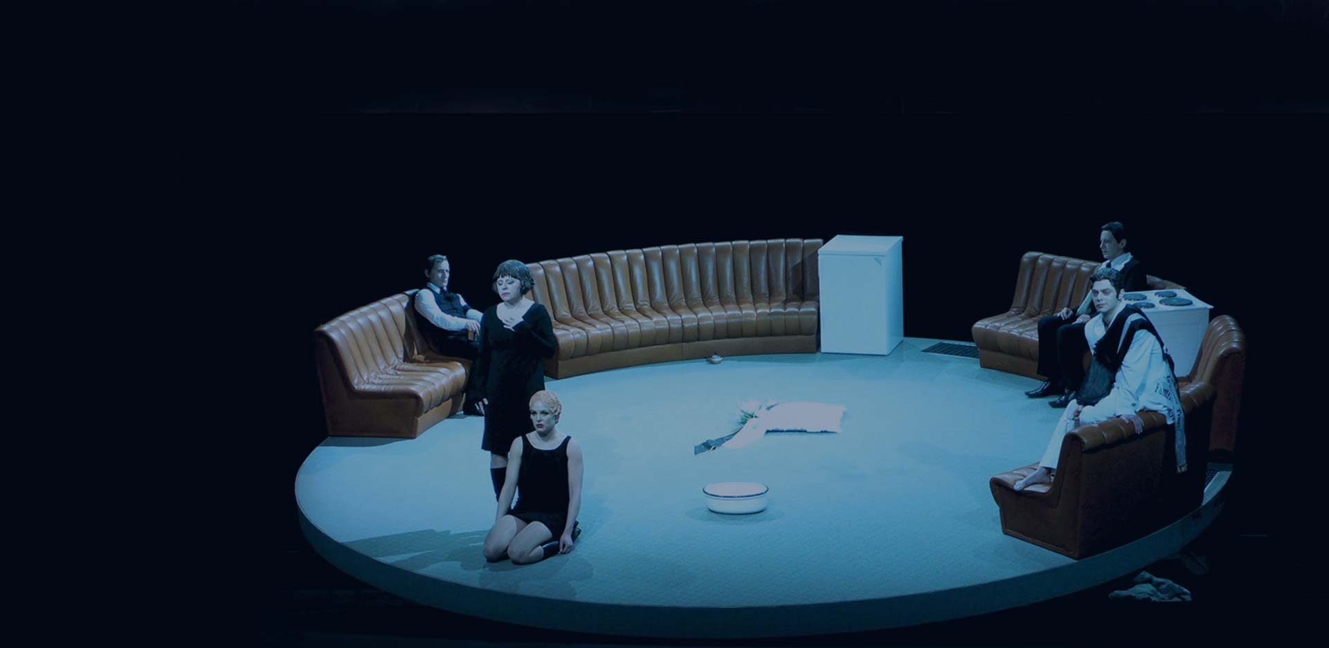 People performing a play on a mobile turntable from HOAC