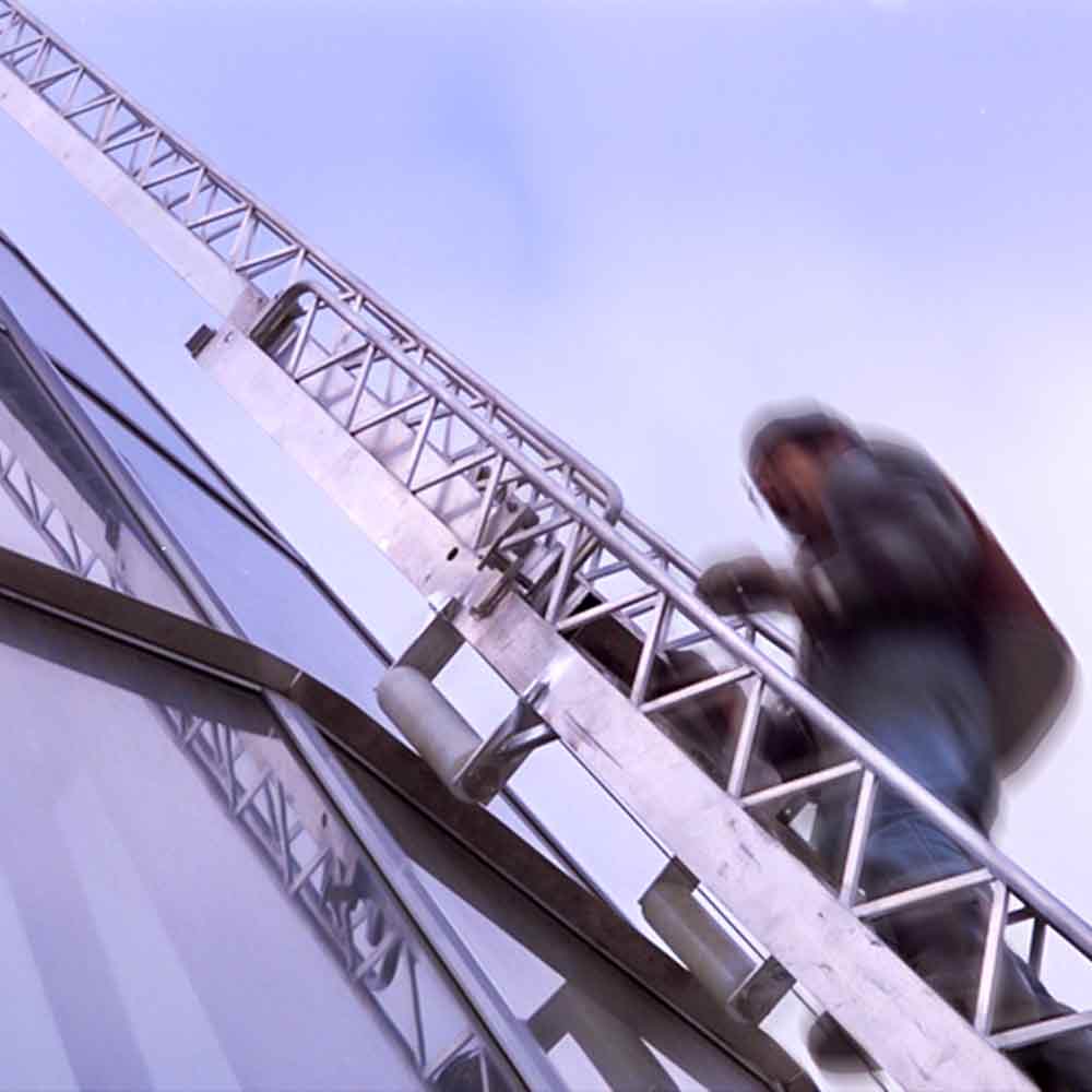 A person on a cleaning bridge from HOAC